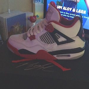 Fired red Jordan 4s